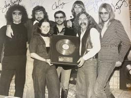 Styx with Lorna Richards and JP Guilbert celebrating Equinox going gold in Canada